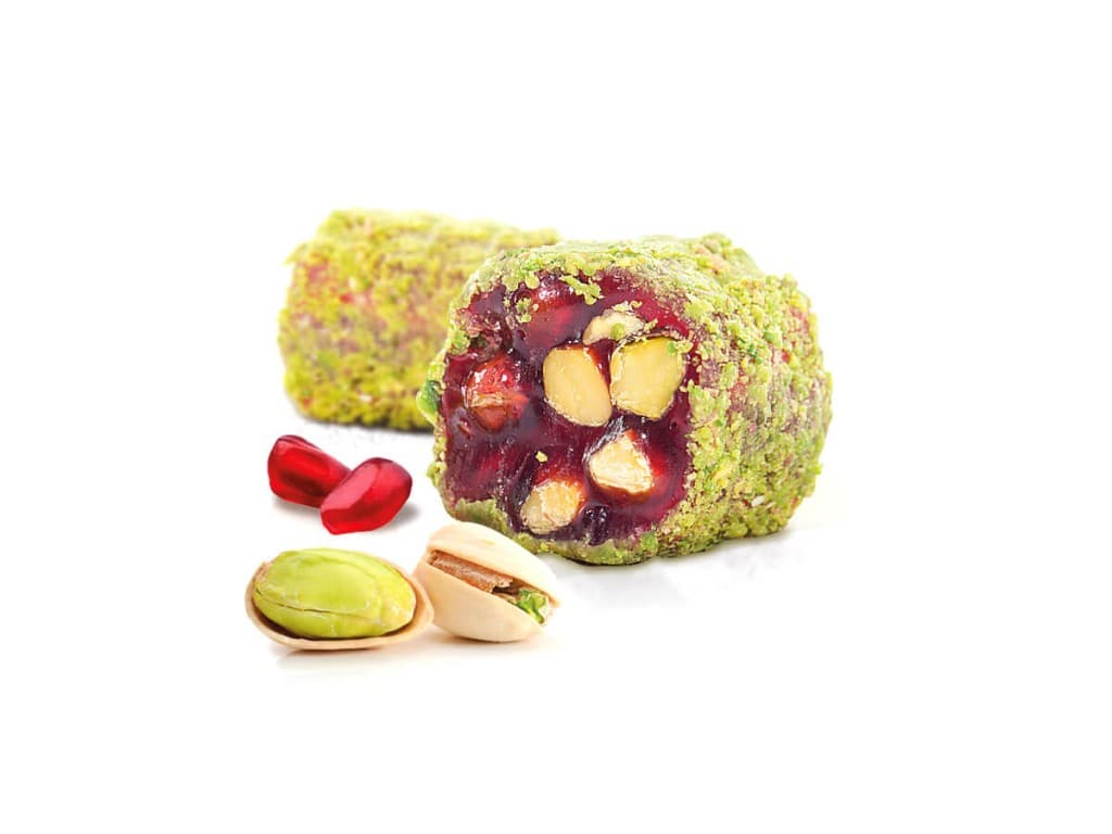 Lokum en bandelettes à la pistache d'Antep, enrobées de poudre de pistache et aromatisées à la grenade